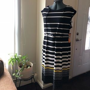 Black, white and yellow , dress with belt.
